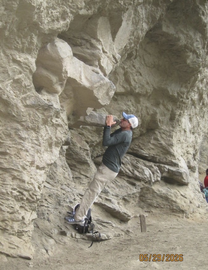 Bouldering on a rock face