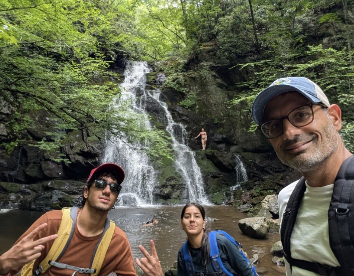 Group photo at a waterfall